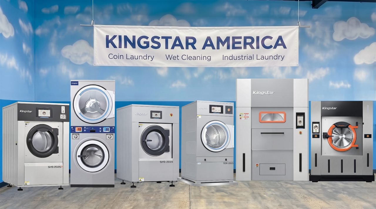 Kingstar America's complete commercial laundry lineup — coin-operated washers, stack washer-dryers, soft-mount washer-extractors, tumble dryers and industrial barrier machines — displayed together at the Anaheim, California showroom.